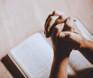 Praying hands for our Monday Motivation Call